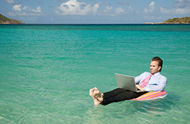 Remote worker on a lie low in the sea